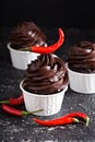 Chocolate cupcakes with mexican chili pepper Royalty Free Stock Photo