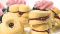 Chocolate cupcakes with raspberry buttercream frosting, and heart shaped cookies close up Royalty Free Stock Photo