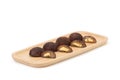 Chocolate daifuku on wooden plate