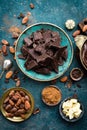 Chocolate. Dark bitter chocolate chunks, cacao butter, cocoa powder and cocoa beans. Chocolate background Royalty Free Stock Photo