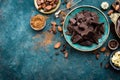 Chocolate. Dark bitter chocolate chunks, cacao butter, cocoa powder and cocoa beans. Chocolate background Royalty Free Stock Photo