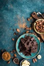 Chocolate. Dark bitter chocolate chunks, cacao butter, cocoa powder and cocoa beans. Chocolate background Royalty Free Stock Photo