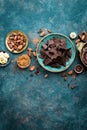 Chocolate. Dark bitter chocolate chunks, cacao butter, cocoa powder and cocoa beans. Chocolate background Royalty Free Stock Photo