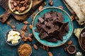 Chocolate. Dark bitter chocolate chunks, cacao butter, cocoa powder and cocoa beans. Chocolate background Royalty Free Stock Photo