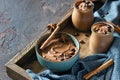 Chocolate dessert with coffee and spices in a wooden tray. Rustic style. Spicy chocolate and coffee mousse Royalty Free Stock Photo