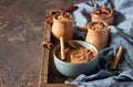 Chocolate dessert with coffee and spices in a wooden tray, selective focus. Spicy chocolate and coffee mousse Royalty Free Stock Photo