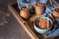 Chocolate dessert with coffee and spices in a wooden tray, selective focus. Spicy chocolate and coffee mousse Royalty Free Stock Photo