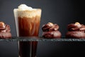 Chocolate dessert with hazelnut and coffee with cream on a black background Royalty Free Stock Photo