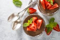 Chocolate dessert of whipped cream and strawberries in glass. Royalty Free Stock Photo