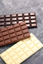 Chocolate in diffrent color. milk, dark and white chocolate bars