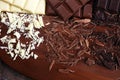 Chocolate in diffrent color. milk, dark and white chocolate bars on table Royalty Free Stock Photo