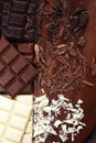 Chocolate in diffrent color. milk, dark and white chocolate bars on table Royalty Free Stock Photo