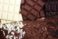 Chocolate in diffrent color. milk, dark and white chocolate bars on table Royalty Free Stock Photo