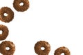 Chocolate donut on white background, isolated. Donut frame with copy space Royalty Free Stock Photo