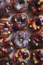 Chocolate donuts with candes and coconut. Chocolate concept.