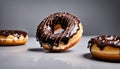 Chocolate Donuts on a Grey Background Royalty Free Stock Photo
