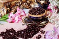 Chocolate dragees in a porcelain coffee cup Royalty Free Stock Photo