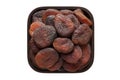 Chocolate dried apricots in square bowl isolated on white background. organic food, top view