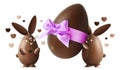 Chocolate Easter bunnies with egg and pink ribbon bow isolated o