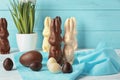 Chocolate Easter Bunnies And Eggs On Table