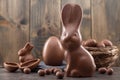 Chocolate Easter bunny, eggs and sweets on rustic background Royalty Free Stock Photo