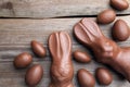 Chocolate Easter bunny and eggs on wooden background Royalty Free Stock Photo
