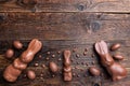 Chocolate Easter bunny and eggs on wooden background Royalty Free Stock Photo