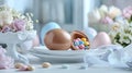 chocolate Easter egg broken open to reveal colorful candy inside, placed on a white plate Royalty Free Stock Photo