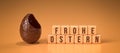 Chocolate easter egg with cubes and the message HAPPY EASTER in German  - 3d rendered illustration Royalty Free Stock Photo