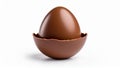 Chocolate Easter egg open revealing a sweet treat on white background Royalty Free Stock Photo