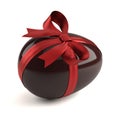 Chocolate easter egg with red ribbon Royalty Free Stock Photo