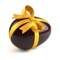 Chocolate easter egg with yellow ribbon