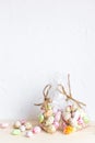 Chocolate Easter eggs, candy in glaze in a transparent bag on a light background Royalty Free Stock Photo