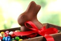 Chocolate Easter eggs and chocolate bunny and colorful sweets. Royalty Free Stock Photo
