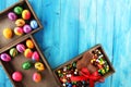 Chocolate Easter eggs and chocolate bunny and colorful sweets. Royalty Free Stock Photo