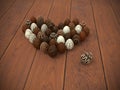 Chocolate Easter eggs heart on brown wooden floor Royalty Free Stock Photo