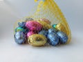 Chocolate Easter eggs in a net candy Royalty Free Stock Photo