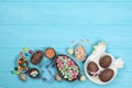 Chocolate easter eggs,sweets on a blue background