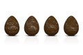 Chocolate Easter eggs with texts Royalty Free Stock Photo