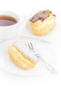 Chocolate eclair dessert powdered sugar Royalty Free Stock Photo