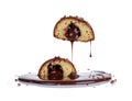 Chocolate filled cake cut in half with melted chocolate dripping isolated on a white background. Generative AI Royalty Free Stock Photo