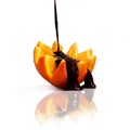 Chocolate flows on orange.