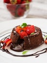 Chocolate fondant (cupcake) with strawberries Royalty Free Stock Photo