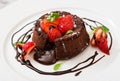 Chocolate fondant (cupcake) with strawberries Royalty Free Stock Photo