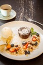 Chocolate fondant with vanilla ice cream, almond Royalty Free Stock Photo