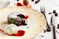 Chocolate fondant with vanilla ice cream and strawberry Royalty Free Stock Photo