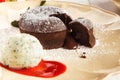 Chocolate fondant with vanilla ice cream and strawberry Royalty Free Stock Photo