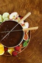 Chocolate fondue with various fruits - delicious dessert Royalty Free Stock Photo