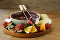 Chocolate fondue with various fruits - delicious dessert Royalty Free Stock Photo