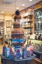 Chocolate fountain in belgium shop Royalty Free Stock Photo